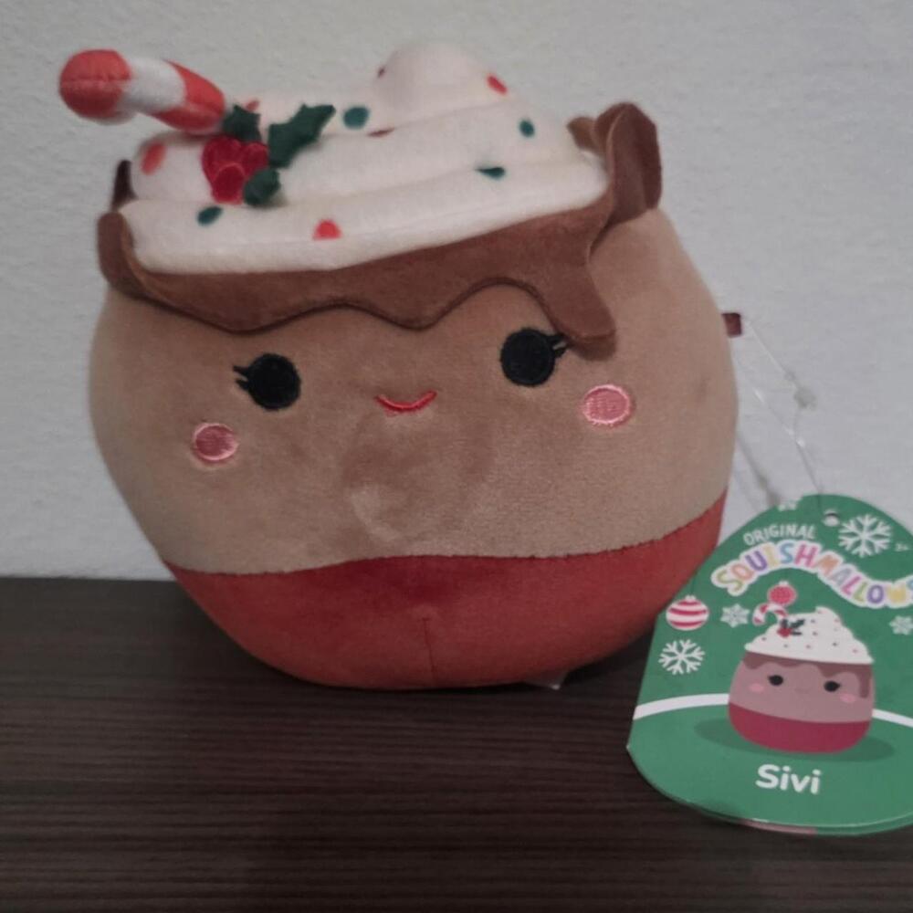 Squishmallow Sivi hot chocolate with whipped cream, candy cane, and holly #chris